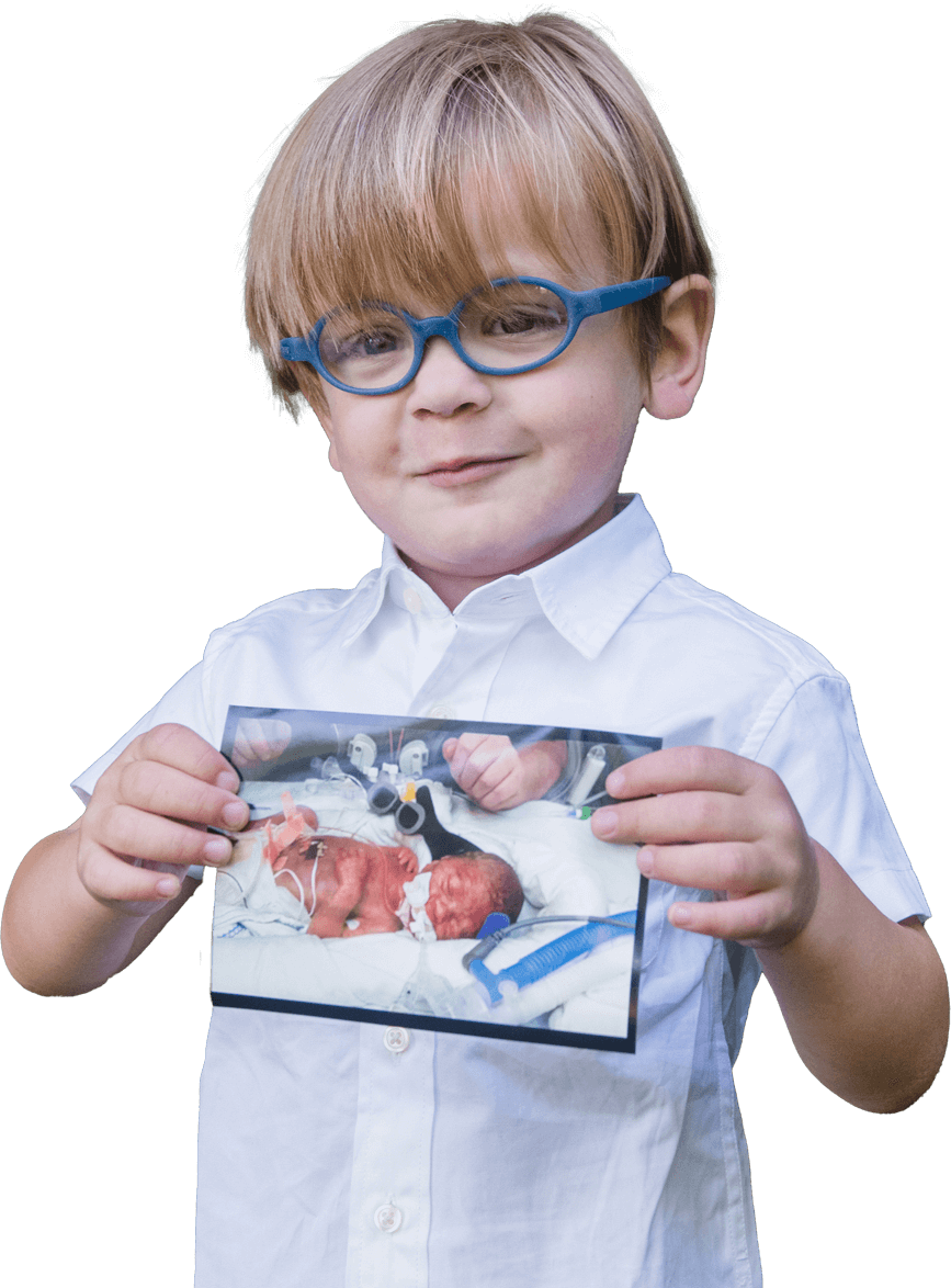 boy holding photo
